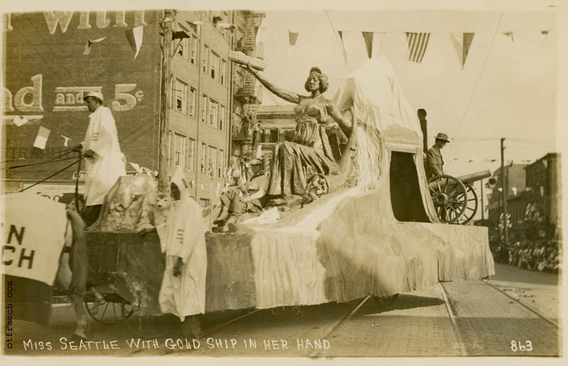 Image 863 - Miss Seattle with Gold Ship in Her Hand